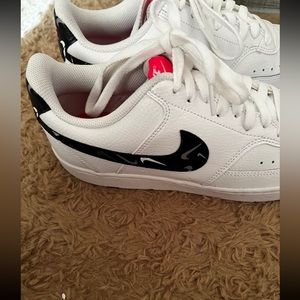 Women white Nike Court vision low